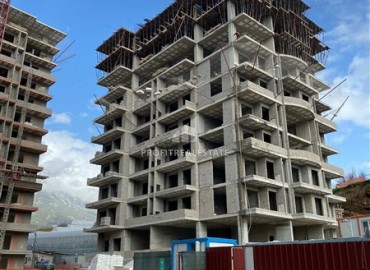 Недорогие квартиры на этапе строительства. Новый инвестиционный проект в Махмутларе, Аланья, 57-109 м2 ID-4597 фото-12