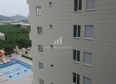 Уютные двухкомнатные апартаменты, укомплектованные мебелью, в 300 метрах от центра Махмутлара, Аланья, 68 м2 ID-5651 фото-11