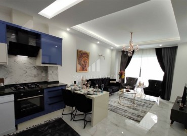 Просторная двухкомнатная квартира с мебелью, в новой резиденции Махмутлара, Аланья, 55 м2 ID-5743 фото-1