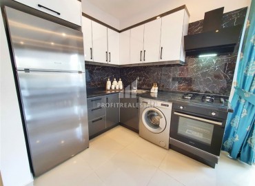 Недорогие двухкомнатные апартаменты, с мебелью и техникой, в новой резиденции Махмутлара, Аланья, 50 м2 ID-5769 фото-5