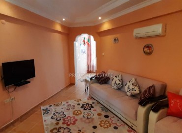 Меблированные апартаменты, с одной спальней, в центре Махмутлара, Аланья, 50 кв.метров. ID-5887 фото-3