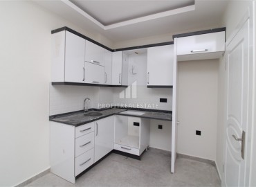 Новая двухкомнатная квартира, в чистовой отделке, в 300 метрах от центра Махмутлара, Аланья, 55 м2 ID-5755 фото-4