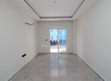 Новая двухкомнатная квартира, в чистовой отделке, в 300 метрах от центра Махмутлара, Аланья, 55 м2 ID-5755 фото-8