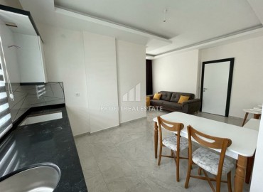 New one-bedroom apartment, at a bargain price, in a residential complex, built in 2020, Mahmutlar, Alanya ID-5334 фото-3