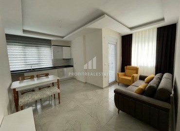 New one-bedroom apartment, at a bargain price, in a residential complex, built in 2020, Mahmutlar, Alanya ID-5334 фото-4
