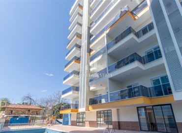 Двухкомнатная квартира, в новом жилом комплексе, на завершающем этапе строительства, всего в 300 метрах от центра Махмутлара, Аланья ID-5152 фото-2