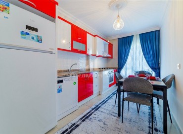 Two bedroom apartment with a designer interior and a separate kitchen, 300 meters from the center of Mahmutlar, Alanya, 120 m2 ID-5951 фото-5