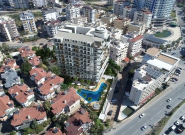 Недвижимость на этапе строительства в Алании. Новый инвестиционный проект в популярном районе Тосмур, 43-124 м2 ID-5348 фото-9