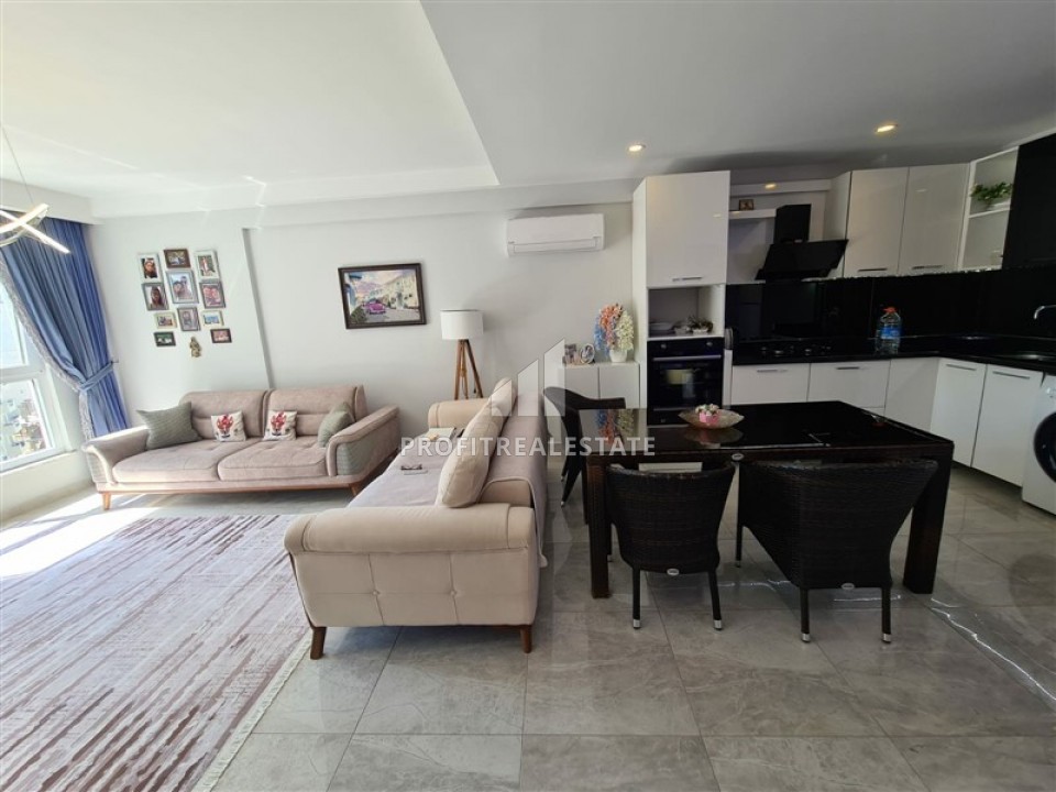 Spacious, furnished 1 + 1 apartment with an area of 75m2 in Mahmutlar ID-6026 фото-2