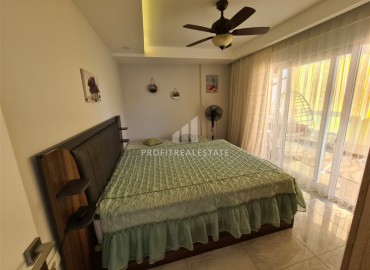 Spacious, furnished 1 + 1 apartment with an area of 75m2 in Mahmutlar ID-6026 фото-6