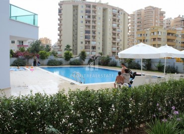 Spacious, furnished 1 + 1 apartment with an area of 75m2 in Mahmutlar ID-6026 фото-18
