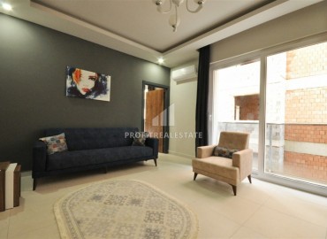 New furnished apartment, 1 + 1 layout with an area of 50m2 in Mahmutlar, Tuesday market area ID-5028 фото-3