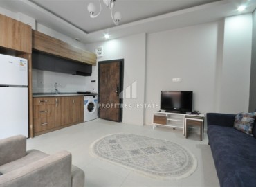 New furnished apartment, 1 + 1 layout with an area of 50m2 in Mahmutlar, Tuesday market area ID-5028 фото-4