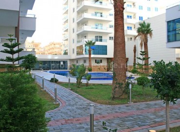 Furnished apartment with two bedrooms and sea view on the main street of Mahmutlar ID-0388 фото-8