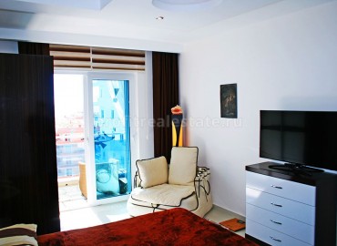 Furnished apartment with two bedrooms and sea view on the main street of Mahmutlar ID-0388 фото-18