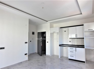 One-bedroom apartment in fine finish, in the new residence of Mahmutlar, 53 m2 ID-6047 фото-3