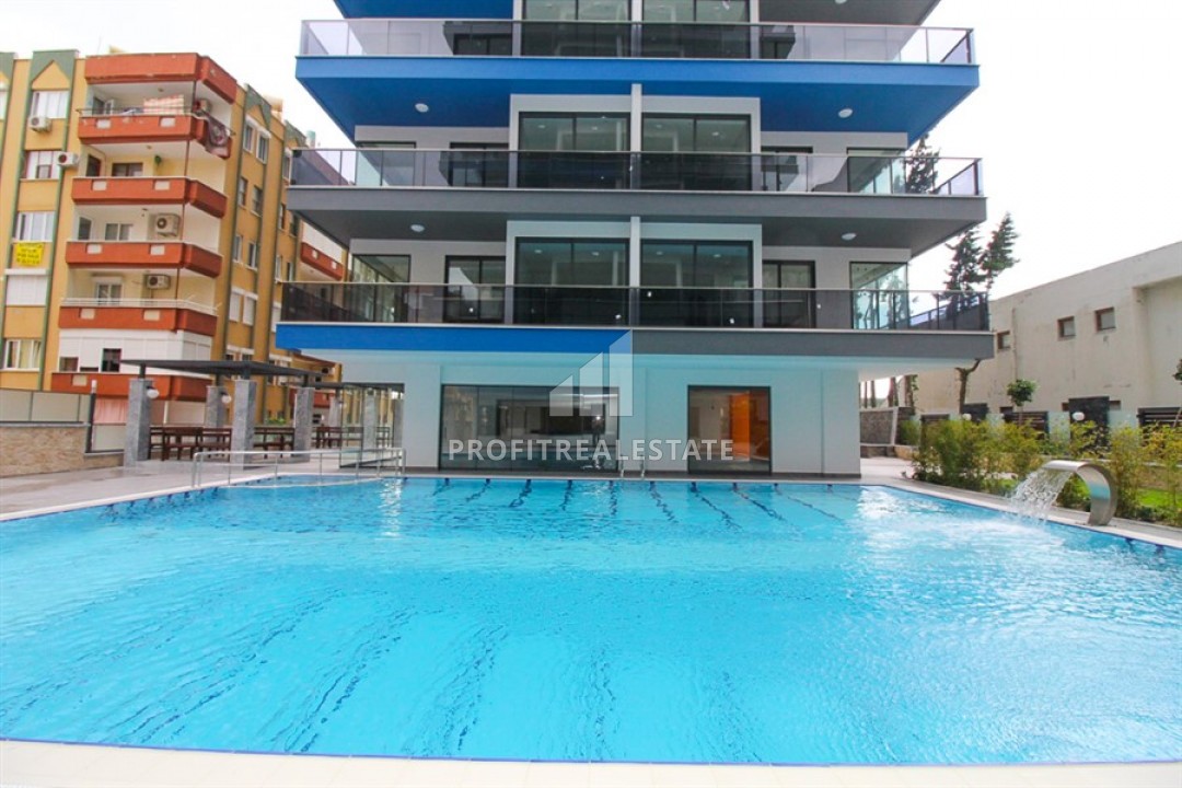 One-bedroom apartment on the first coastline, with furniture and appliances, Mahmutlar, Alanya, 65 m2 ID-6081 фото-1