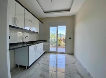 Квартира 2+1 с отдельной кухней в новом комплексе в Махмутларе ID-6080 фото-3