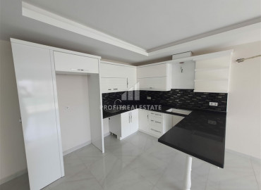 New apartment 1 + 1 in the center of Mahmutlar, with an excellent location, 150m from the sea ID-6104 фото-9