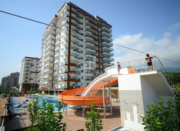 Excellent combination of price and quality: furnished one-bedroom apartment near the sea in Mahmutlar ID-6126 фото-1