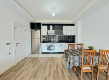 Отличное сочетание цены и качества: меблированная двухкомнатная квартира недалеко от моря в Махмутларе ID-6126 фото-16