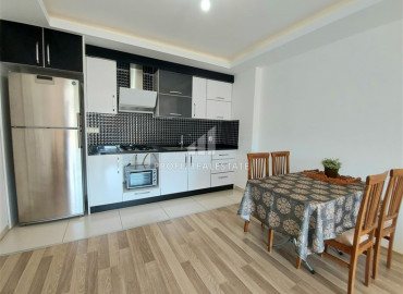 Отличное сочетание цены и качества: меблированная двухкомнатная квартира недалеко от моря в Махмутларе ID-6126 фото-18