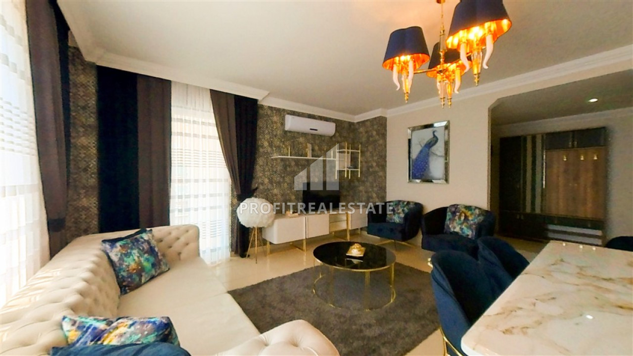Two bedroom apartment, with designer furnishings, 300 m from the sea in Mahmutlar ID-6131 фото-1
