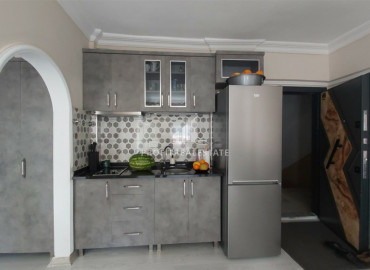 Inexpensive apartment 1 + 1 in an urban-type house in Mahmutlar ID-6149 фото-4