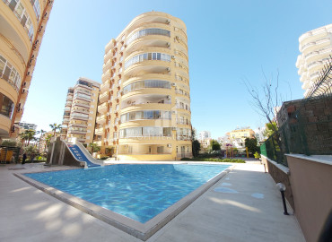Two-bedroom apartment with furniture and appliances, 300 m from the sea in Mahmutlar ID-6180 фото-1