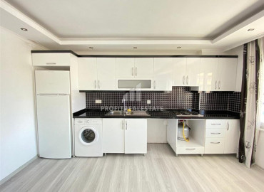 Inexpensive one bedroom apartment, with furniture and appliances, in Mahmutlar, Alanya, 70 m2 ID-6200 фото-4