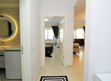 Двухкомнатные апартаменты, с большой общей площадью, укомплектованные мебелью и техникой, в Махмутларе, Аланья, 70 м2 ID-6208 фото-13