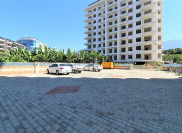 Двухкомнатные апартаменты, с большой общей площадью, укомплектованные мебелью и техникой, в Махмутларе, Аланья, 70 м2 ID-6208 фото-18