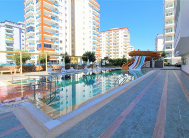 Large furnished one-bedroom apartment in a residence with rich facilities near the sea in Mahmutlar ID-6213 фото-28