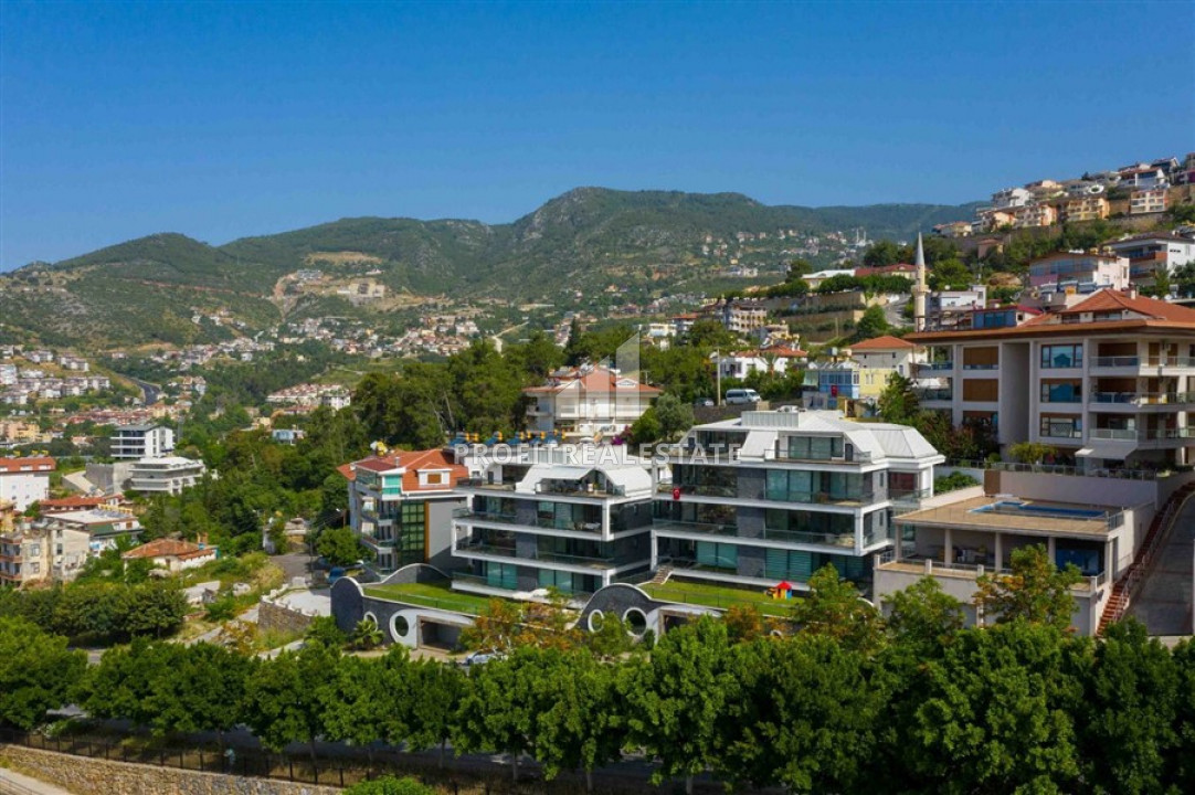 Luxury real estate in Alanya with panoramic views: 2 + 1 apartment in Hasbahce ID-6225 фото-1
