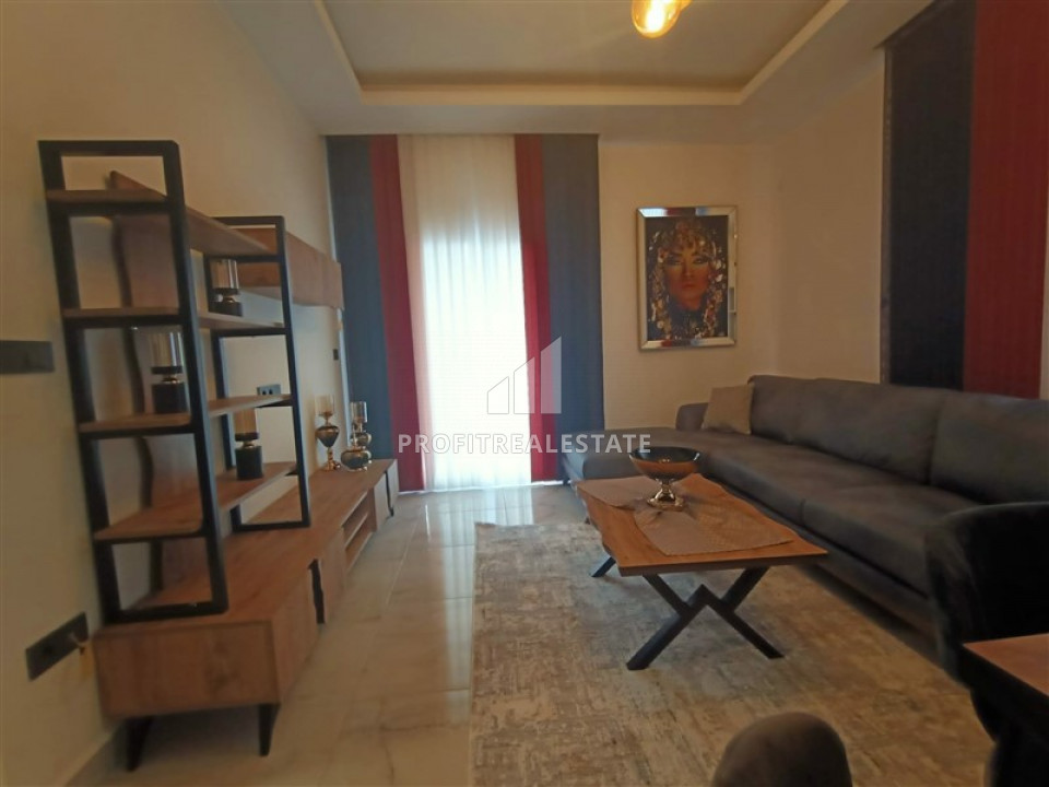 Furnished 1 + 1 apartment in a new residence with complete facilities in Mahmutlar ID-6254 фото-2
