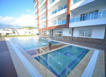 Apartment with sea view in the area of Kargicak, Alanya, Turkey ID-0410 фото-3