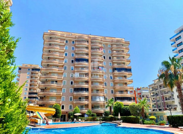 Two-bedroom apartment with a good location 400 m from the sea in Mahmutlar in a residence with good facilities ID-6274 фото-1