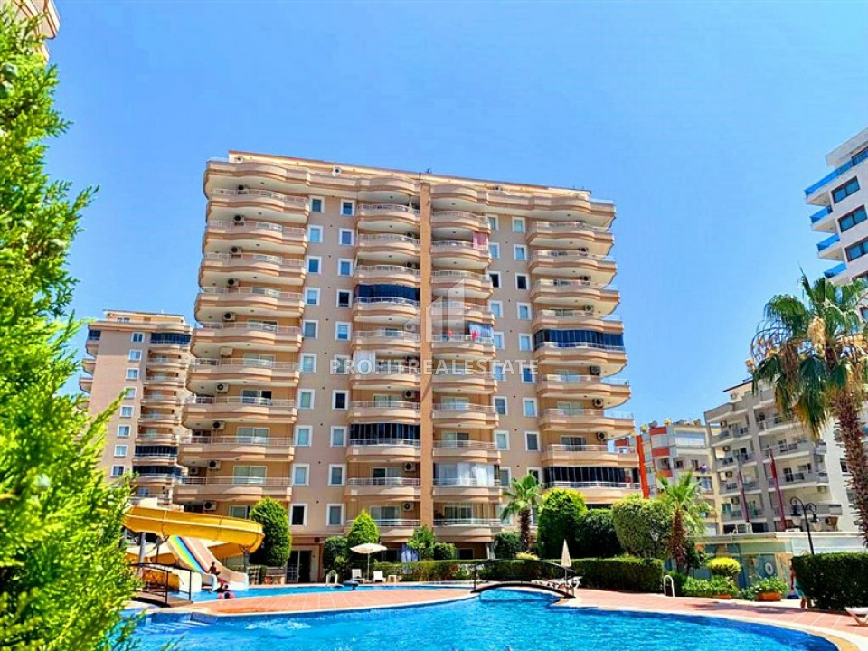 Two-bedroom apartment with a good location 400 m from the sea in Mahmutlar in a residence with good facilities ID-6274 фото-1
