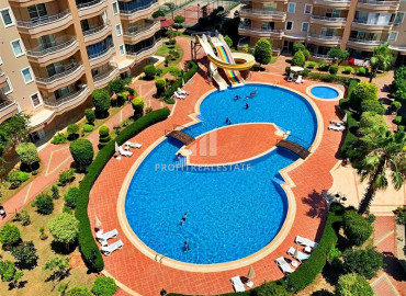 Two-bedroom apartment with a good location 400 m from the sea in Mahmutlar in a residence with good facilities ID-6274 фото-12
