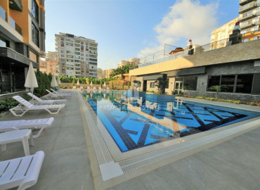 New furnished apartment 2 + 1 with a separate kitchen in a residence with wide facilities in Mahmutlar ID-6299 фото-21