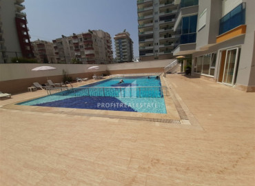 Resale property 500 m from the sea: furnished one-bedroom apartment, 65 m², in Mahmutlar ID-6303 фото-14