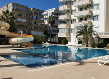 Apartment 2 + 1 overlooking the sea and the Alanya fortress in a residence with good facilities in Mahmutlar ID-6327 фото-3