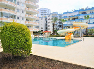 Apartment 2 + 1 overlooking the sea and the Alanya fortress in a residence with good facilities in Mahmutlar ID-6327 фото-4