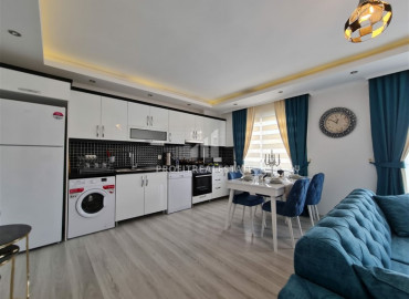 Обустроенная двухкомнатная квартира на высоком этаже, 70м² в центре Махмутлара в 350 м от моря ID-6328 фото-4
