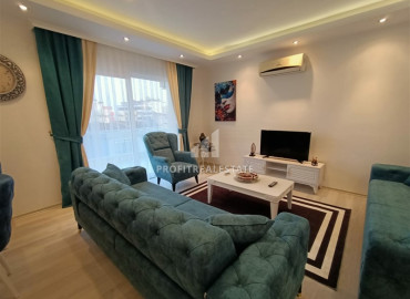 Обустроенная двухкомнатная квартира на высоком этаже, 70м² в центре Махмутлара в 350 м от моря ID-6328 фото-8