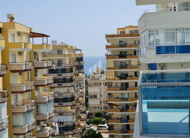 Furnished one-bedroom apartment on a high floor, 70m² in the center of Mahmutlar, 350 m from the sea ID-6328 фото-17