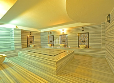 Обустроенная двухкомнатная квартира на высоком этаже, 70м² в центре Махмутлара в 350 м от моря ID-6328 фото-29