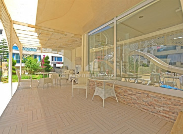 Обустроенная двухкомнатная квартира на высоком этаже, 70м² в центре Махмутлара в 350 м от моря ID-6328 фото-30