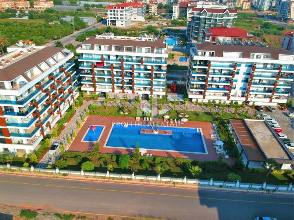 Well-groomed apartment 2 + 1 in a residence with excellent infrastructure 200 m from the sea in the Alanya - Kestel area ID-6344 фото-1