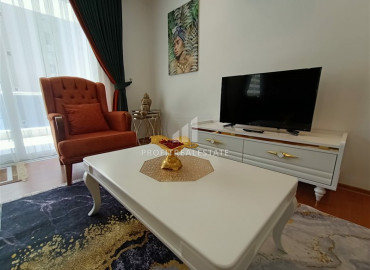Furnished one bedroom apartment on a high floor, 70m² in the center of Mahmutlar ID-6345 фото-6